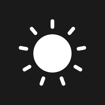 Sun dark mode glyph ui icon. Brightness tool. Simple filled line element. user interface design. White silhouette symbol on black space. Solid pictogram for web, mobile. Vector isolated illustrationのイラスト素材