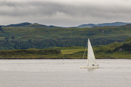 Oban, Scotland / United Kingdom - Jul 09 2017: Sailboat.のeditorial素材