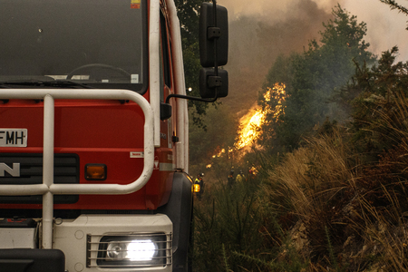 Maceda, Galicia / Spain - Oct 16 2017: Fire engine in forest fire.のeditorial素材