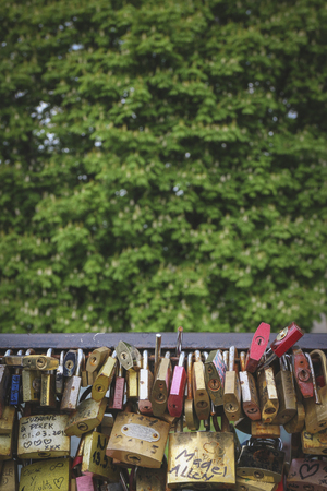 Paris, France - Apr 13 2017: Love padlocks at bridge over Seine river.のeditorial素材