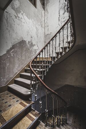 Stairs in old and ruined abandoned house.の写真素材