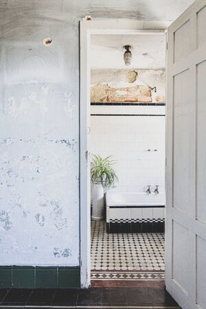 Bathroom old and ruined abandoned house.の写真素材