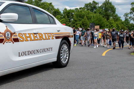 Ashburn, Va. - June 14, 2020: A Loudoun County, Virginia Sheriff's Office car blocks traffic as a...