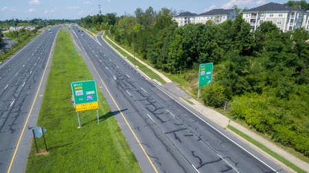 Aerial view of highway signs directing motorists on Route 97 (Georgia Avenue)  to MD 200 (Intercounty Connector) in Montgomery County, Maryland.の写真素材