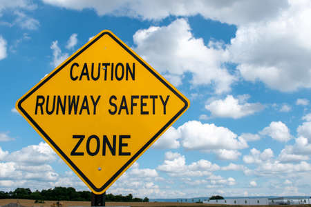 A runway safety zone sign warns motorists of aviation activity near Hagerstown Regional Airport (HGR) in Washington County, Maryland.の写真素材