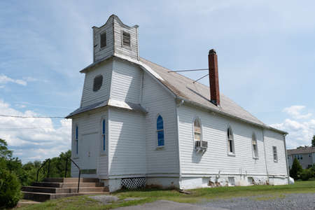 GAITHERSBURG, MD - JUNE 26, 2020: Sunlight shines on the Mount of Olives Church in Montgomery County, Maryland. The site dates back to 1868, and was  home to the Pleasant View Methodist Episcopal Church and the Quince Orchard Colored School.のeditorial素材