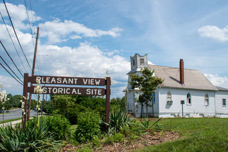 GAITHERSBURG, MD - JUNE 26, 2020: A sign marks the Pleasant View Historical Site in Montgomery County, Maryland. The site dates back to 1868, and was home to the Pleasant View Methodist Episcopal Church and the Quince Orchard Colored School.のeditorial素材