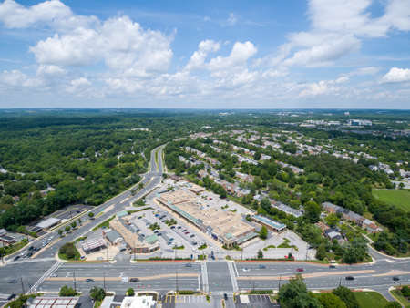 Gaithersburg, Md. - June 28, 2020: Aerial view of The Shops at Potomac Valley in the Quince Orchard area of Gaithersburg, Montgomery County, Maryland. The parking lot is well under capacity amid the coronavirus pandemic.のeditorial素材