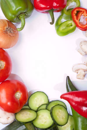 Heap of different veggies on wooden boardの写真素材