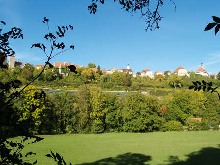 The Skyline of Rothenburg with a meadow in front of itの写真素材