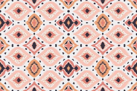 Ikat geometric folklore ornament with diamonds. Tribal ethnic vector texture. Seamless striped...