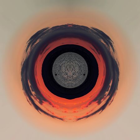Photo with the effect of polar coordinates. Red planet. A circular image of a bright red-orange...