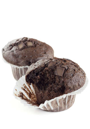 Two double chocolate muffins isolated on whiteの写真素材