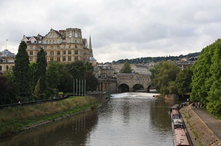 View of Bath and River Avon: Pultney Bridge, the Empire, riverside walk.の写真素材
