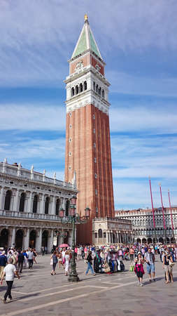 VENICE, ITALY - SEPTEMBER 26: Campanile or bell tower of St Mark's church and the Logetta at its foot in Piazza San Îarco or St Mar's Square on September 26, 2014 in Venice, Italy.のeditorial素材