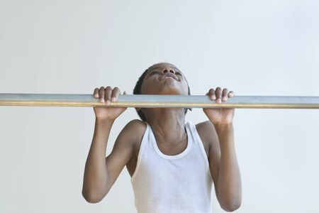 Young boy doing push upsの写真素材
