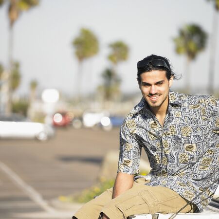 Portrait of a young man smilingの写真素材