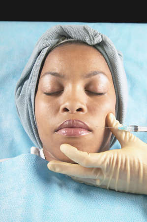 Female patient having an injection