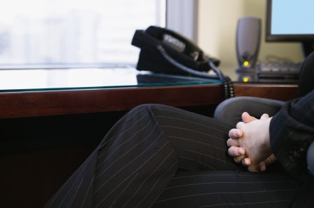 Businesswoman sitting at deskの写真素材