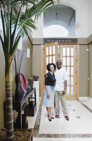 Couple posing inside homeの写真素材