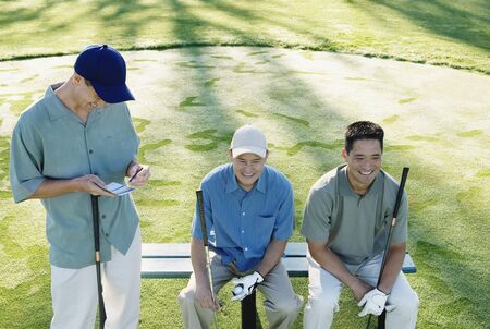 Golfers taking a breakの写真素材