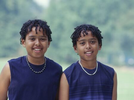 Portrait of twin boys smilingの写真素材