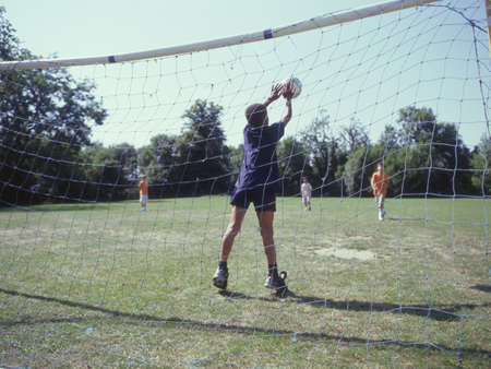 Boys playing soccerの写真素材