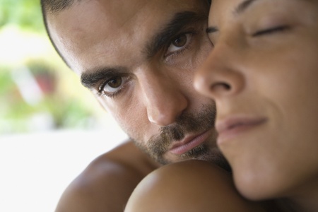 Young couple huggingの写真素材