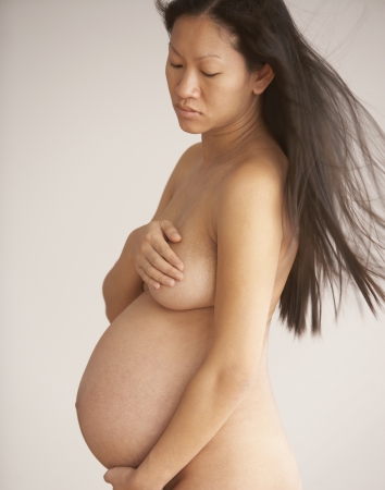 Nude pregnant womanの写真素材