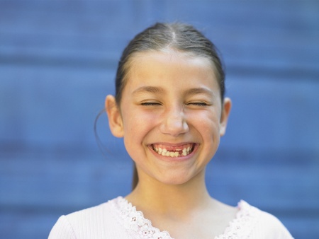 Young girl grinning for the camera