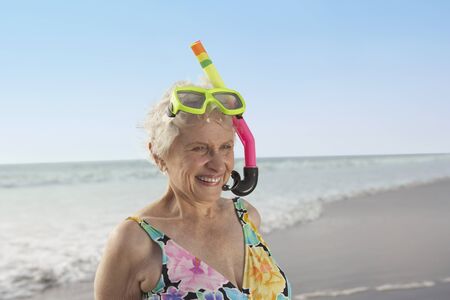 Senior woman wearing snorkeling gear on the beach, Las Vegas, Nevada, United Statesの写真素材