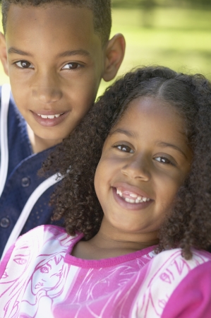 Portrait of African brother and sister outdoorsの写真素材