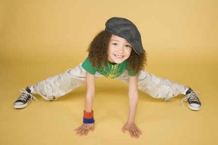 Portrait of young girl doing splitsの写真素材