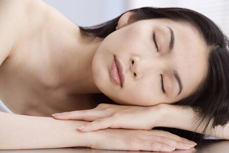 Asian woman sleepingの写真素材