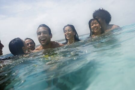 South American friends in waterの写真素材