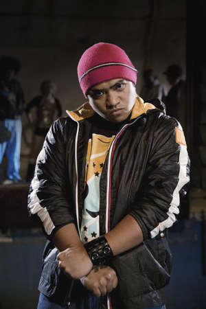 Asian male breakdancer posing