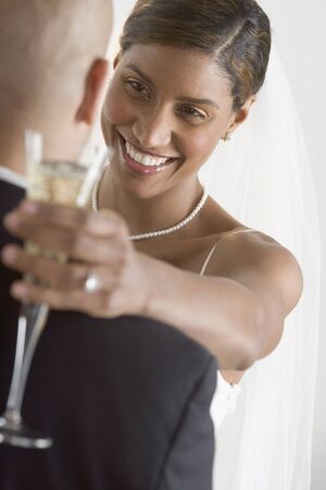 Young newly wedded couple dancingの写真素材