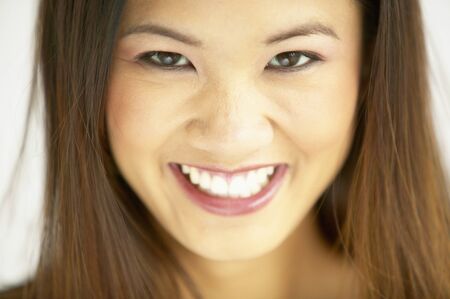 Portrait of a young woman smilingの写真素材