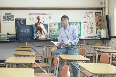 Male teacher in classroom