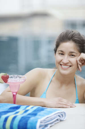 Woman standing in swimming pool