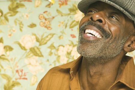 Middle aged man laughing for the cameraの写真素材