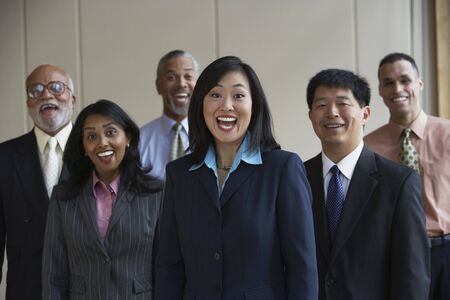 Group of co-workers laughing