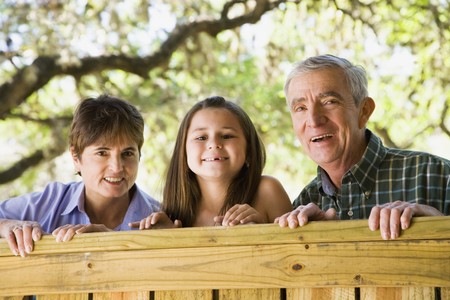 Hispanic family smiling outdoorsの写真素材