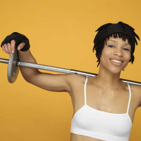 African woman lifting weights