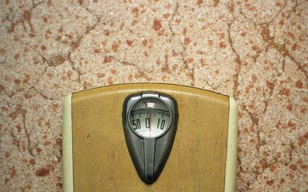 Scale from 1950's on linoleum floorの写真素材