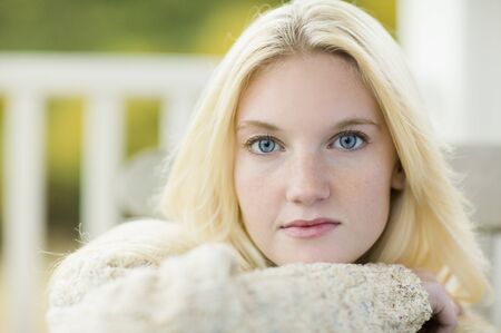 Close up of young woman wearing sweaterの写真素材
