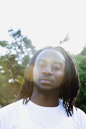 Portrait of African man in sunlightの写真素材