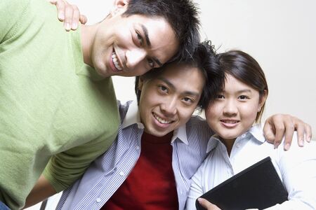 Portrait of young businesspeople in huddleの写真素材
