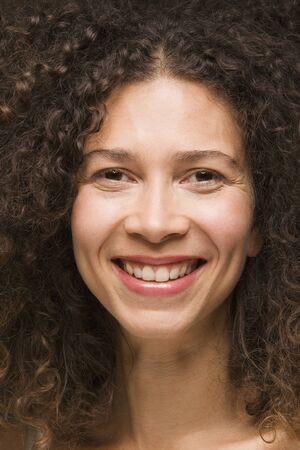 Close up of Hispanic woman smilingの写真素材
