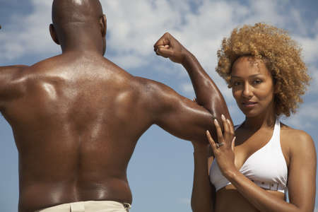 African man flexing for wifeの写真素材